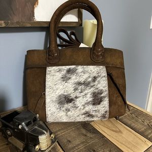 STS Ranchwear ladies real leather and cowhide conceal carry purse. CB strap